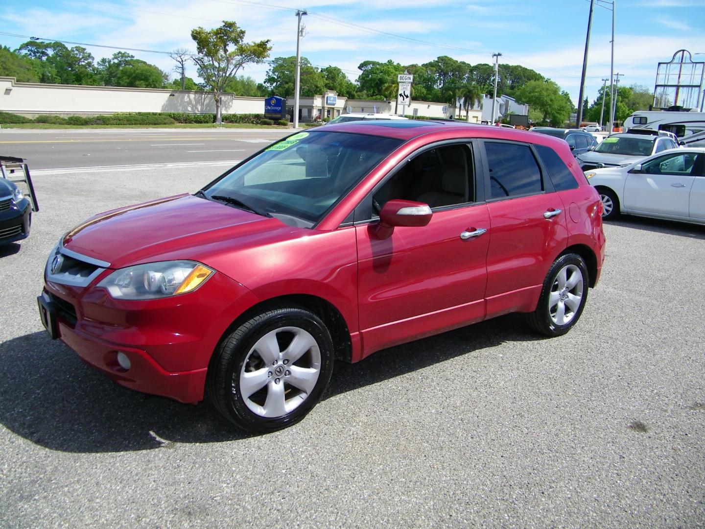 2008 Red /Gray Acura RDX 5-Spd AT (5J8TB18228A) with an 2.3L L4 DOHC 16V engine, 5-Speed Automatic Overdrive transmission, located at 4000 Bee Ridge Road, Sarasota, FL, 34233, (941) 926-0300, 27.298664, -82.489151 - Photo#0